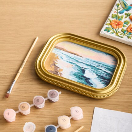 Watercolor Painting on a table with a paint set