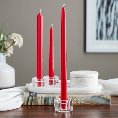 3 red tapers in glass holders