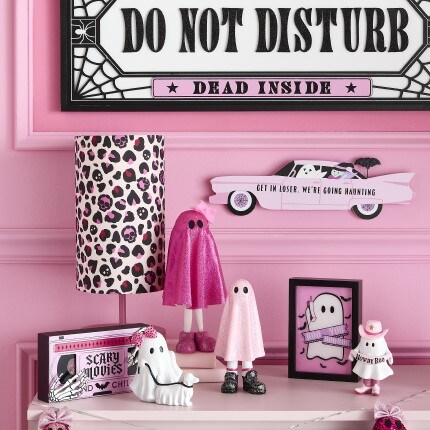 Halloween Sweet & Spooky Collection featuring tabletop decor and wall decor in pink and white colors: cute ghosts, lamp, wall signs.