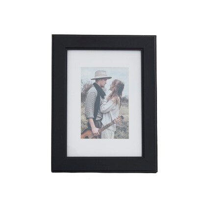 black frame with photo of couple