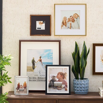 Decorative photo frames in a wall