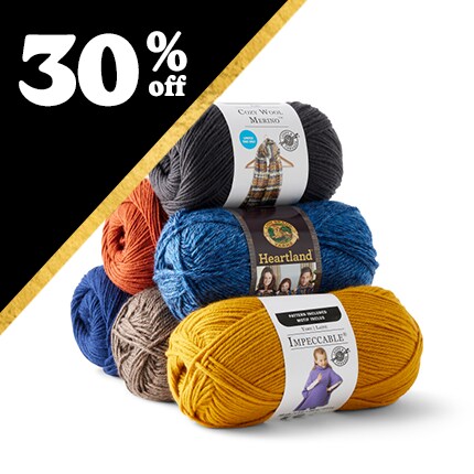 pyramid of yarn skeins with 30% off in white text in black triangle