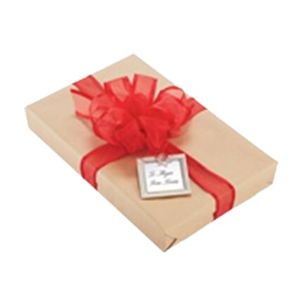 brown paper wrapped gift with red bow and tag