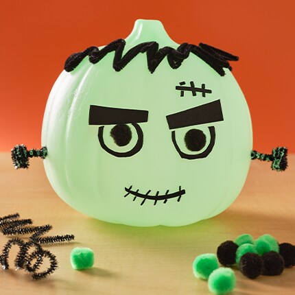 glow in the dark decorated pumpkin