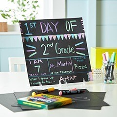 chalkboard with first day information