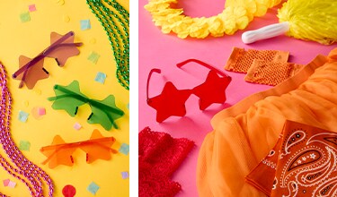pink boa, blue cowboy hat, orange socks and yellow pom-pom