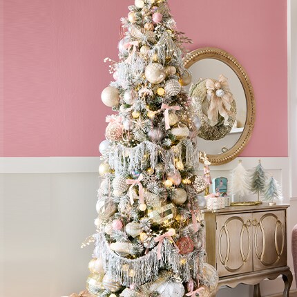 Christmas tree with silver, gold, and pink ornaments