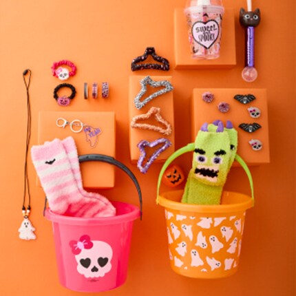 kids toys and buckets for Halloween