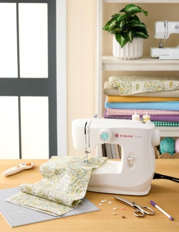 Sewing machine and fabric on table