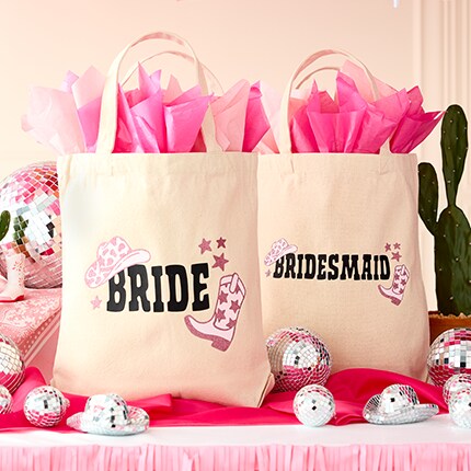 disco ball decor on table with balloons and cactus