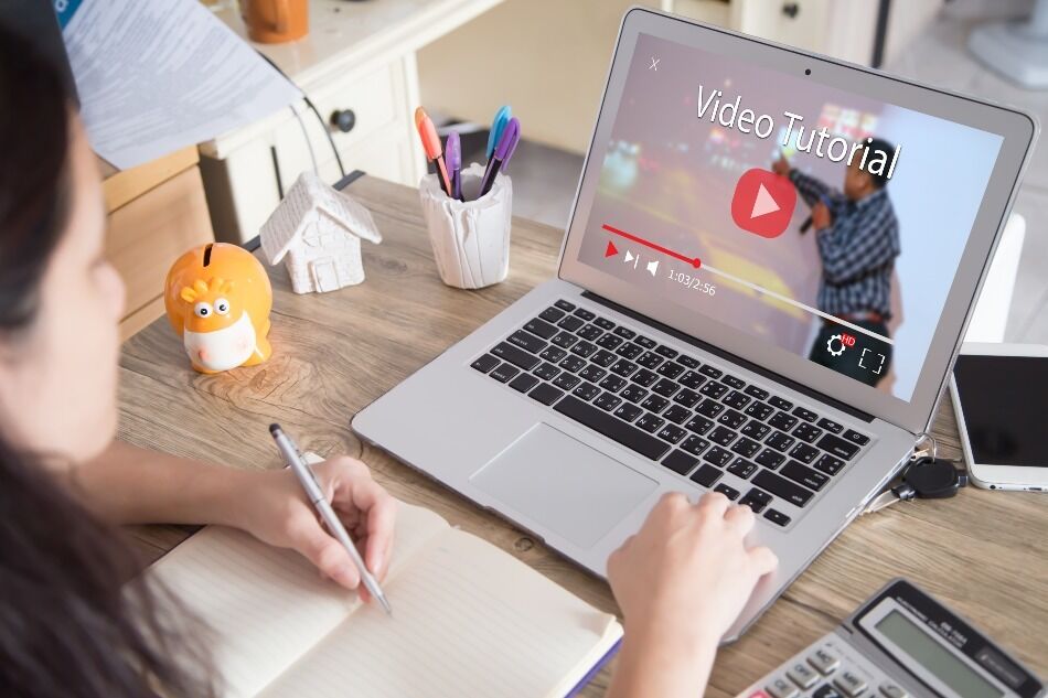 A person watching a video tutorial