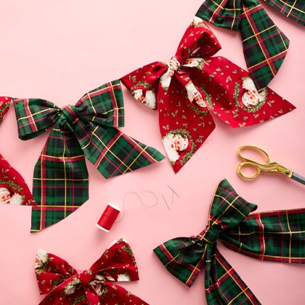 Christmas themed fabric bows sewn into garland 