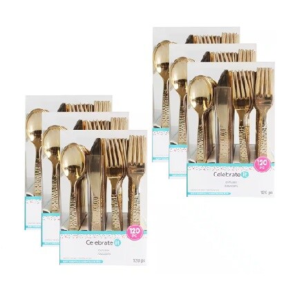 six packages of plastic gold silverware