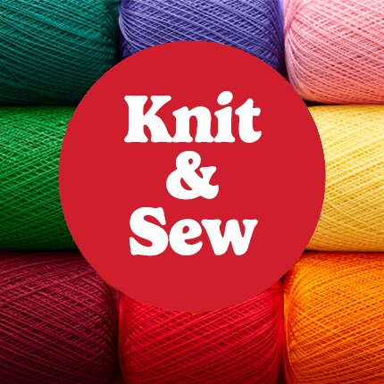 knit and sew in white text in red bubble over spools of thread in rainbow colors