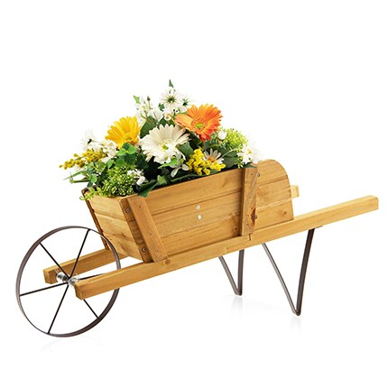 small wood wheel barrow with flowers