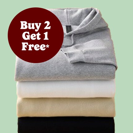 stack of folded long sleeve gildan t-shirts