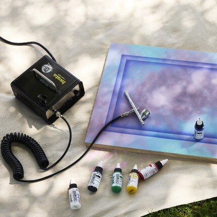 Iwata airbrush machine with painted door.