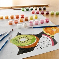 5 paint pots with green kiwi image