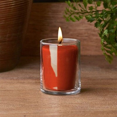 1 orange votive in glass holder