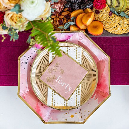 forty birthday place setting with pink, gold and marroon colors