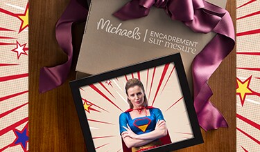 A framed image of a woman in a superhero costume.