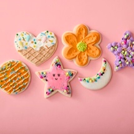 Sweet Street decorated cookies, pink background