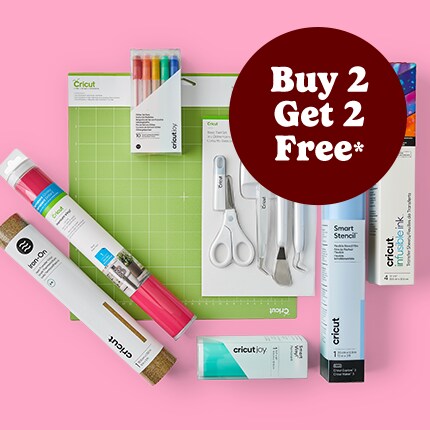 Cricut cutting mat, vinyl rolls and weeding tools with pink background and Buy 2 Get 2 Free*