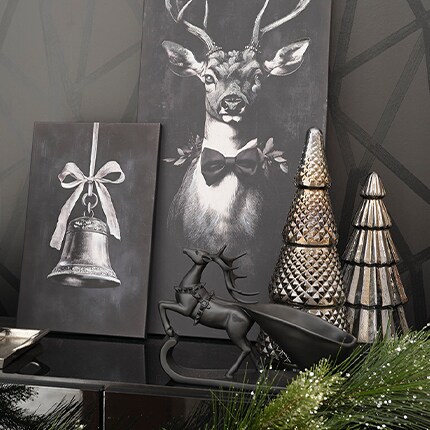 Christmas Tabletop Decor: decorative small tabletop reindeers in black, two gold tabletop trees and two wall canvas (one with a deer and one with a bell)
