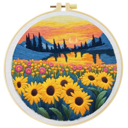 MakerPlace by Michaels Embroidery art depicting a vibrant landscape: yellow sunflowers and pink flowers in the foreground, with a sunrise over mountains and a lake in the background.