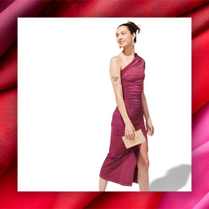 Model wearing a red silk dress