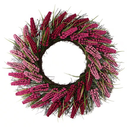 Wreath made of intertwined twigs adorned with clusters of small pink and red flowers and green grass-like leaves.