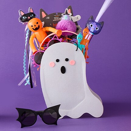 Ghost basket with halloween toys inside