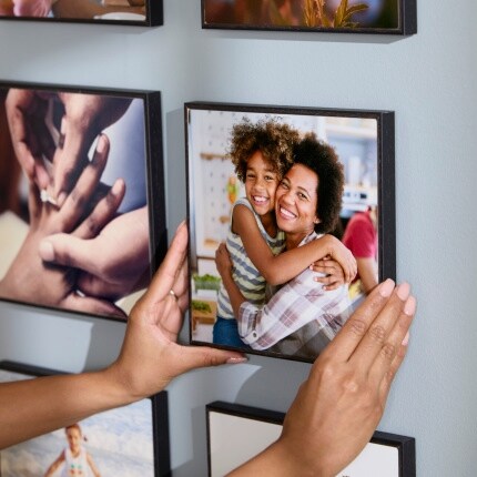 hands hanging square photograph wall tile