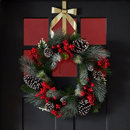A greenery wreath from a door
