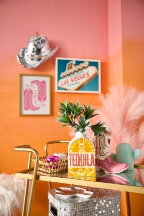 pink and orange wall with vegas and western disco accents