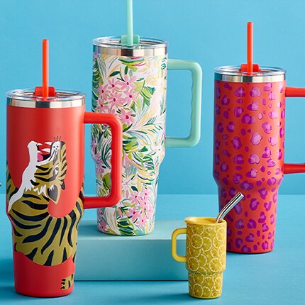 Tumblers for spring with a tiger print and floral designs