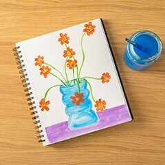 vase with flowered sketched in a sketchbook