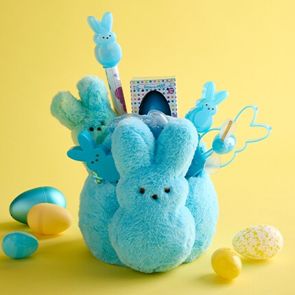 PEEPs toys and stuffed animals in a basket