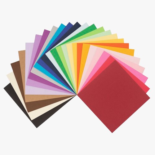 Single sheets of cardstock paper stacked in rainbow order. 