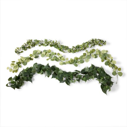 Three leaf garlands arranged horizontally on a white background.