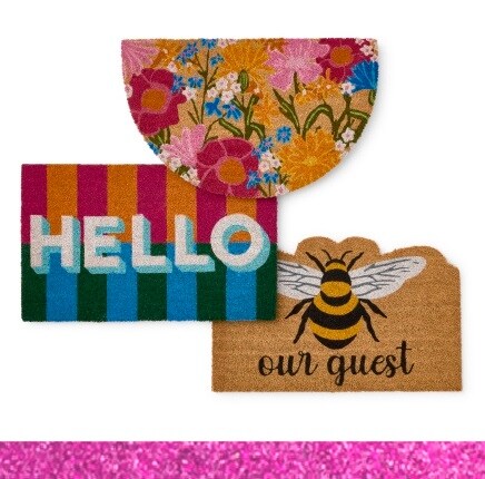 three spring themed doormats