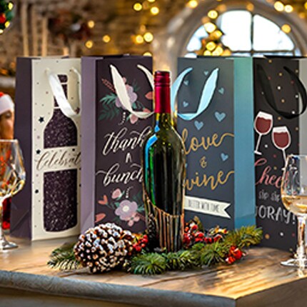 festive wine bottles on table