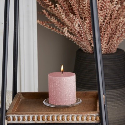 1 pink pillar on glass holder