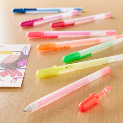 variety of gelly roll pen sets on a table