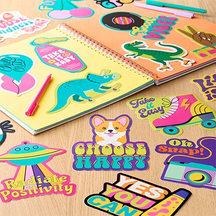 various stickers on a school desk