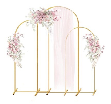 three gold arches with flower arrangements