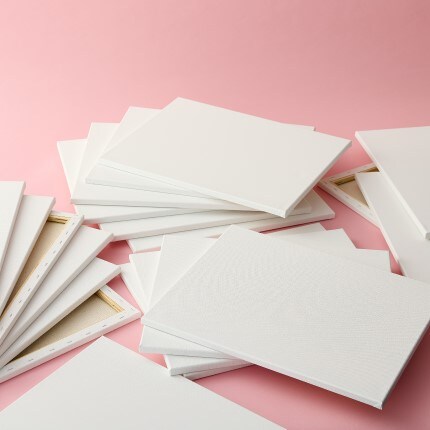 stacks of value canvas on pink background
