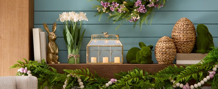 Easter Meadow decor collection inspired with natural grass eggs and greenery with a large wreath with a big blue bow