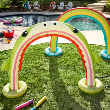 Kids outdoor toys and floats in a pool